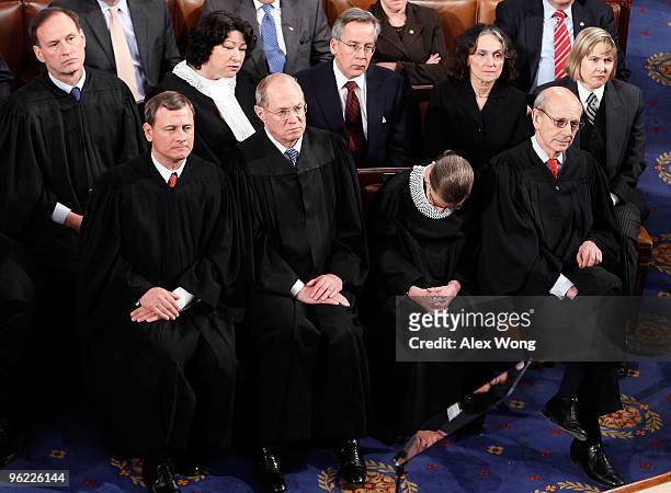 Supreme Court Justice Ruth Bader Ginsburg appears to doze during U.S. President Barack Obama's first State of the Union address at the U.S. Capitol...
