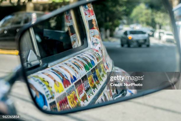 Fusca full of figurines is seen in the streets of Sao Paulo, Brazil, on 25 May 2018. The owner said that his friends glued 15,000 figurines from the...