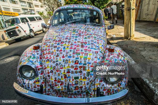 Fusca full of figurines is seen in the streets of Sao Paulo, Brazil, on 25 May 2018. The owner said that his friends glued 15,000 figurines from the...