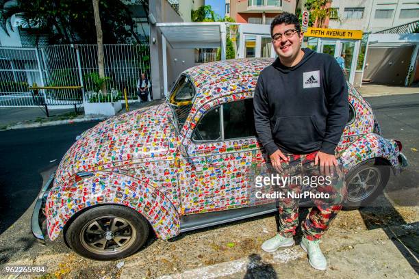 Fusca full of figurines is seen in the streets of Sao Paulo, Brazil, on 25 May 2018. The owner said that his friends glued 15,000 figurines from the...