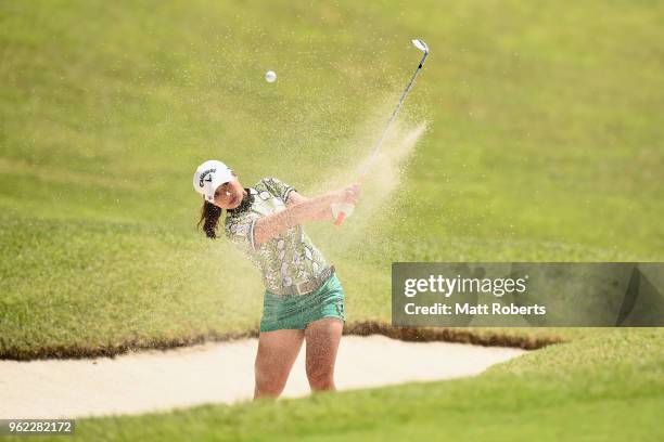 Miyuki Takeuchi of Japan hits out of the bunker on the 9th hole during the first round of the Resorttust Ladies at Kansai Golf Club on May 25, 2018...