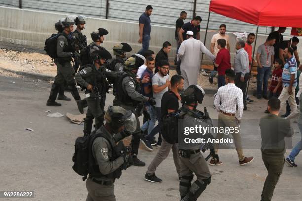 Israeli authorities intervene Palestinian men as they try to cross Qalandiya checkpoint to perform second Friday Prayer of Islamic holy month Ramadan...