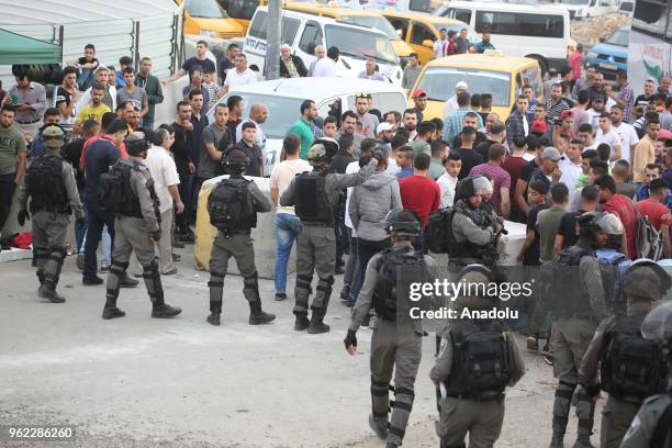 Israeli authorities intervene Palestinian men as they try to cross Qalandiya checkpoint to perform second Friday Prayer of Islamic holy month Ramadan...