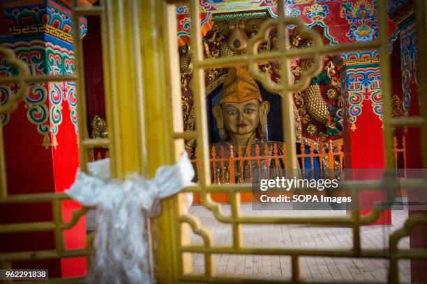 View of a Buddha statue partially made of gold inside the Ganden Sumtsenling Monastery in Shangri-La.