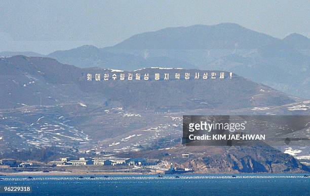 Border area of North Korea's west coast is seen from South Korea's Yeonpyeong Island in the disputed waters of the Yellow Sea, dotted with artillery...