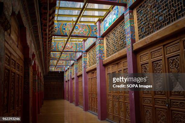 View from an alley made of wood inside the Ganden Sumtsenling Monastery in Shangri-La.