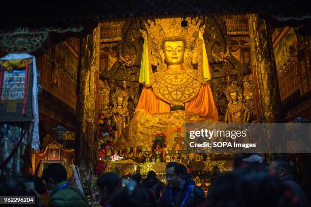 View of a huge Buddha statue partially made of gold inside the Ganden Sumtsenling Monastery in Shangri-La.