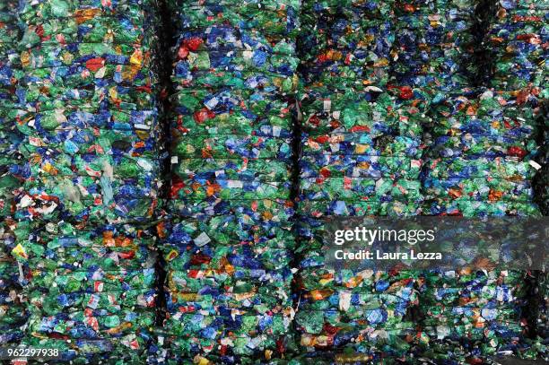 View of bales of materials of colored plastic bottles ready to be recycled including the plastic waste collected by the fishermen during the...