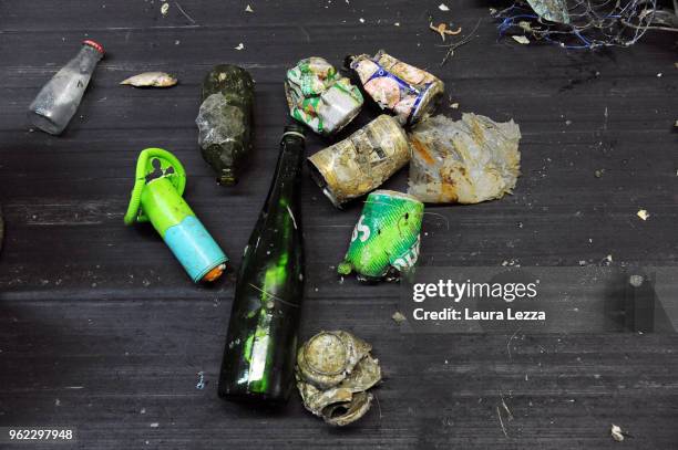 View of plastic waste is displayed inside the company Revet Recycling while workers select the plastic waste collected by the fishermen inside the...