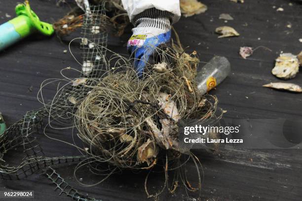 View of plastic waste is displayed inside the company Revet Recycling while workers select the plastic waste collected by the fishermen inside the...