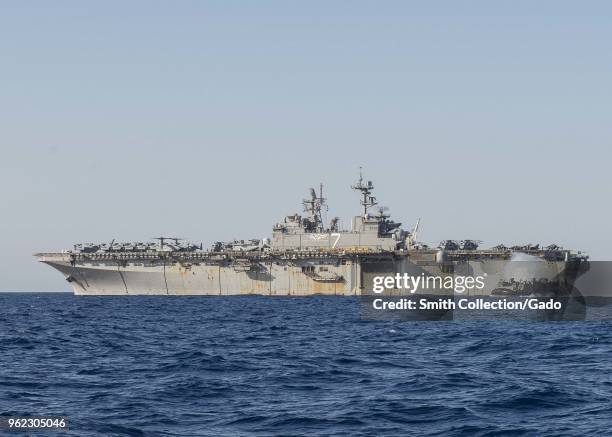 Landing craft air cushion exiting the deck of the Wasp-class amphibious assault ship USS Iwo Jima , May 13, 2018. Image courtesy Petty Officer 3rd...