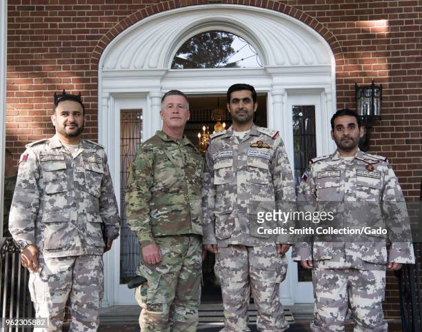 Photograph of Major General James Hoyer with officers of the Qatar armed forces at the governor's mansion, Charleston, West Virginia, May 14, 2018.