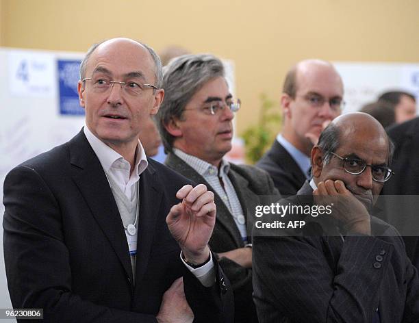 Participants and among them French Benoit Potier, Chairman and CEO of Air Liquide attend a workspace session about "making cap and trade work" at the...