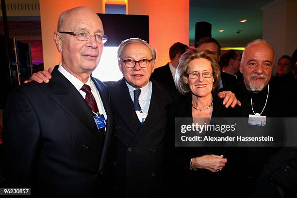 Publisher Hubert Burda pose with Klaus Schwab , founder of world economic forum and Brazilian author Paulo Coelho during the Burda DLD Nightcap 2010...