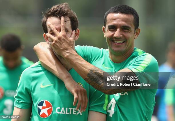 Robbie Kruse and Tim Cahill of Australia walk off the pitch after the Australian Socceroos Training Session at Gloria Football Club on May 25, 2018...