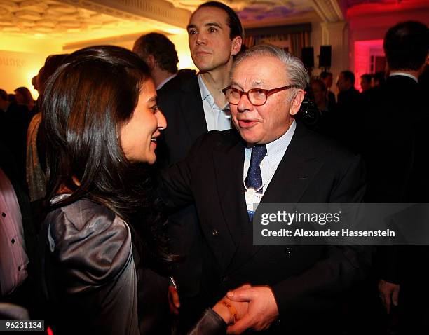 Publisher Hubert Burda talks to Megha Mittal, CEO of Escada, during the Burda DLD Nightcap 2010 at the Bellvedere Hotel on January 27, 2010 in Davos,...