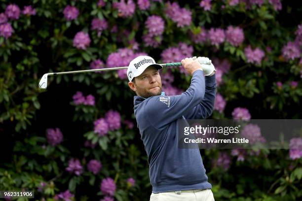 Branden Grace of South Africa tees off on the seventh during day two of the BMW PGA Championship at Wentworth on May 25, 2018 in Virginia Water,...