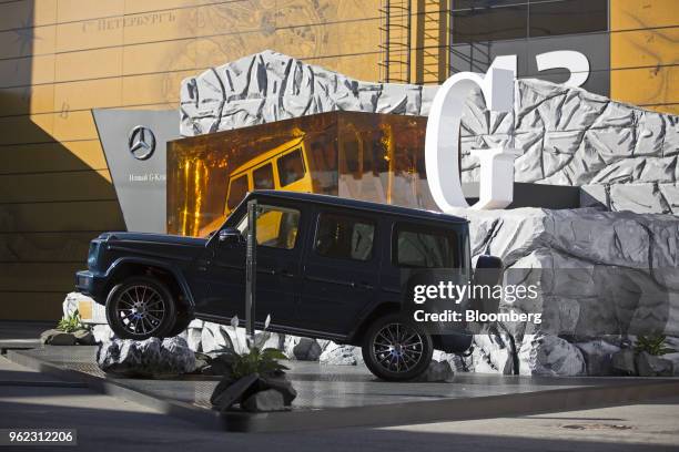 Mercedes-Benz AG G-Class luxury SUV sits on display at the St. Petersburg International Economic Forum in St. Petersburg, Russia, on Friday, May 25,...