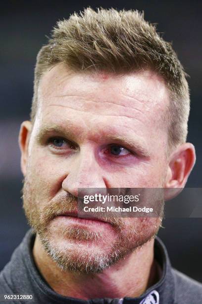 Magpies head coach Nathan Buckley looks upfield during the round 10 AFL match between the Collingwood Magpies and the Western Bulldogs at Etihad...