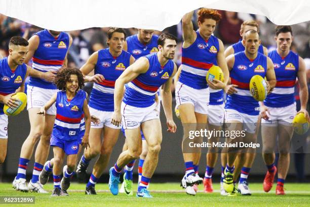 Easton Wood of the Bulldogs leads the team out during the round 10 AFL match between the Collingwood Magpies and the Western Bulldogs at Etihad...