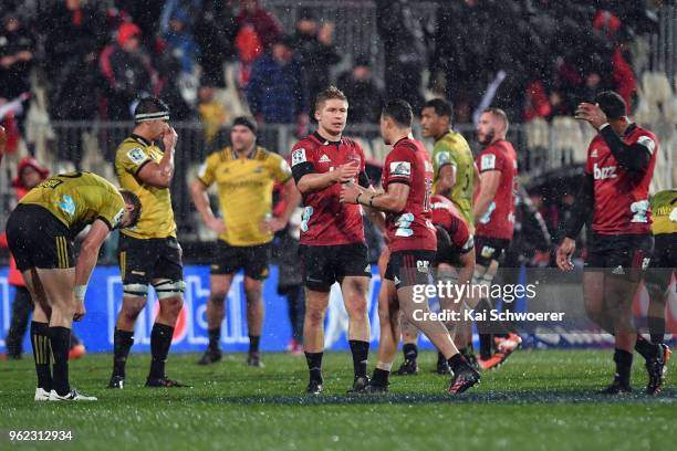 Jack Goodhue of the Crusaders and his team mates celebrate their win in the round 15 Super Rugby match between the Crusaders and the Hurricanes at...