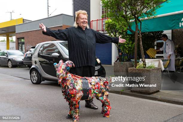 Artist HA Schulte poses during the art campaign 'Ziegenbock der Kuenste' by artist HA Schult on May 16, 2018 in Cologne, Germany.