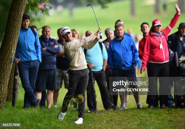 Sweden's Joakim Lagergren plays out of the rough on the third fairway on day two of the golf PGA Championship at Wentworth Golf Club in Surrey, south...