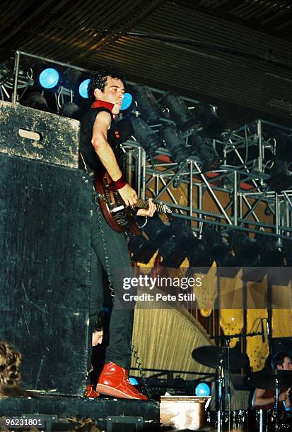 Mick Jones of The Clash performs on stage at Hammersmith Palais on June 16th, 1980 in London, United Kingdom.