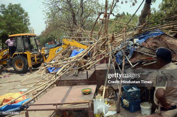 Anti Encroachment drive against illegal hawkers by NMMC at Sector-9, behind Vashi Bus Depot, on May 24, 2018 in Navi Mumbai, India.