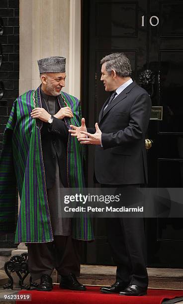 British Prime Minister Gordon Brown talks with President Hamid Karzai of Afghanistan in Downing Street after a breakfast meeting on January 28, 2010...