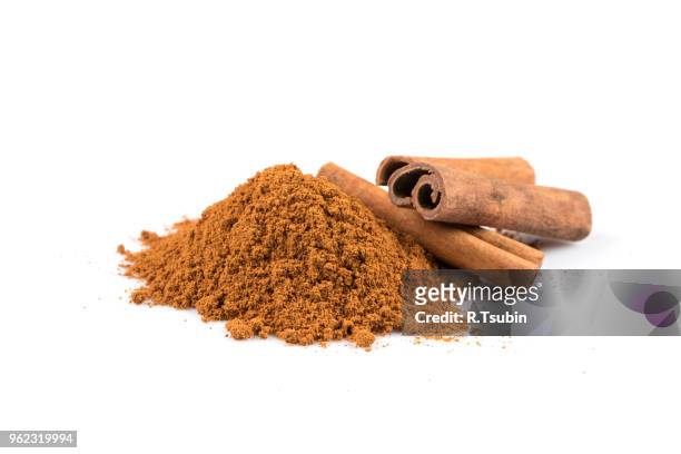 cinnamon sticks with powder isolated on white background - 2015 375 stock pictures, royalty-free photos & images