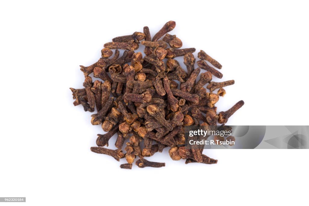 Cloves spice pile isolated on a white background
