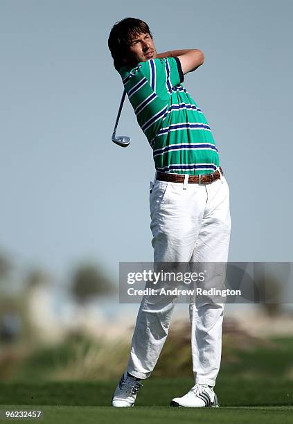 Robert Jan Derksen of The Netherlands plays his third shot on the 18th hole during the first round of the Commercialbank Qatar Masters at Doha Golf...