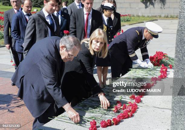 French director Robert Hossein and his wife French actress Candice Patou along with French President and First Lady take part in a ceremony to lay...
