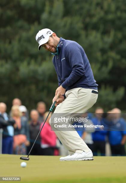 Branden Grace of South Africa reacts after missing an eagle put on the twelth during day two of the BMW PGA Championship at Wentworth on May 25, 2018...