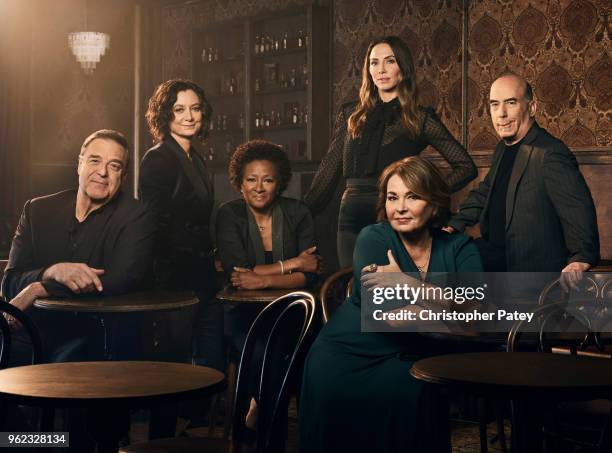 The cast of Roseanne from left to right: John Goodman, Sara Gilbert, Wanda Sykes, Whitney Cummings, Roseanne Barr and producer Bruce Helfrod are...