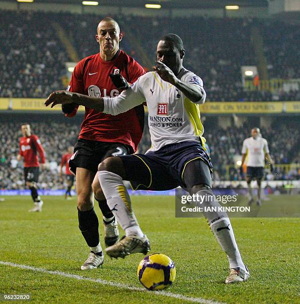 Fulham's Bobby Zamora vies for the ball with Tottenham Hotspurs Ledley King during a Premier League match at White Hart Lane in London, England on...