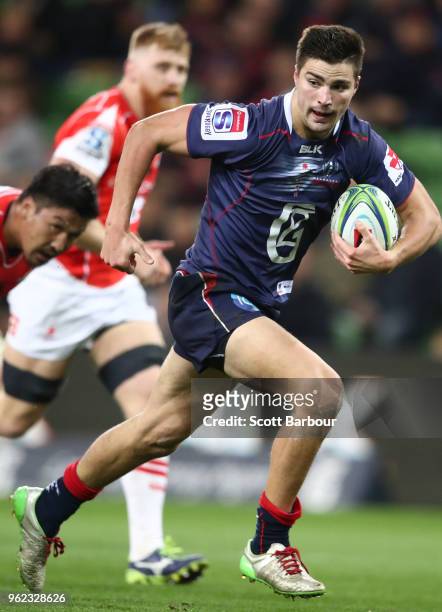 Jack Maddocks of the Rebels breaks a tackle to score a try during the round 15 Super Rugby match between the Rebels and the Sunwolves at AAMI Park on...