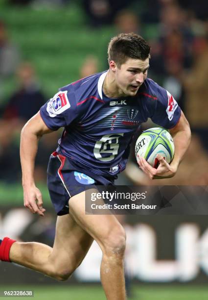 Jack Maddocks of the Rebels breaks a tackle to score a try during the round 15 Super Rugby match between the Rebels and the Sunwolves at AAMI Park on...