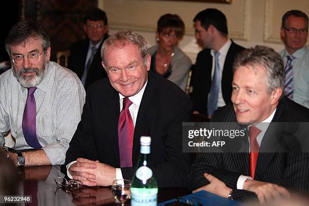 Sinn Fein President Gerry Adams , Northern Ireland politicians Martin McGuinness and Peter Robinson attends at a plenary session with the British and...