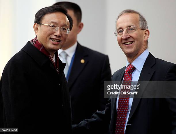 Chinese Foreign Minsiter Yang Jiechi is greeted by Permanent Under Secretary Sir Peter Ricketts as he arrives to attend the Afghanistan London...