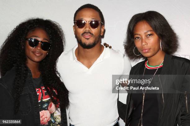 Actor Romeo Miller with his sisters Itali Miller and Inty Miller attend the premiere of "Adolescence" at Laemmle Monica Film Center on May 24, 2018...