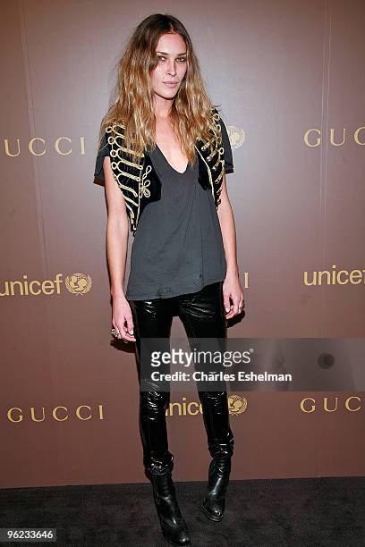 Model Erin Wasson attends the launch of the Tattoo Heart Collection to Benefit UNICEF cocktail reception at Gucci on November 19, 2008 in New York...