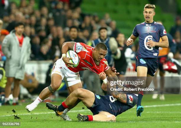 Lomano Lava Lemeki of the Sunwolves is tackled during the round 15 Super Rugby match between the Rebels and the Sunwolves at AAMI Park on May 25,...