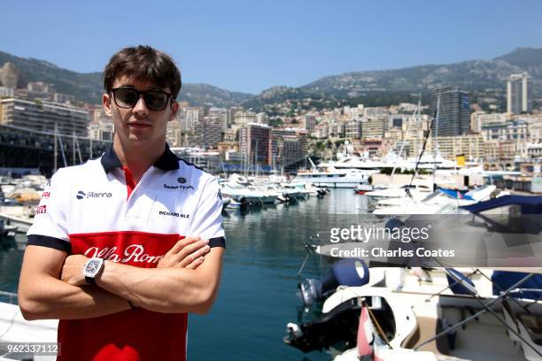 Charles Leclerc of Monaco and Sauber F1 poses for a photo in front of the harbour during previews ahead of the Monaco Formula One Grand Prix at...