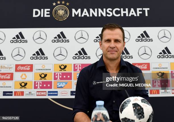 Germany's national football team manager Oliver Bierhoff arrives to address a press conference at the Rungghof training center in Girlan, close to...