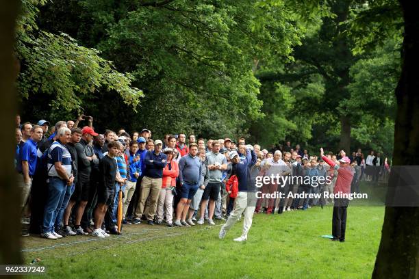 Branden Grace of South Africa plays his second shot on the seventeenth during day two of the BMW PGA Championship at Wentworth on May 25, 2018 in...