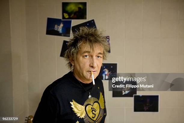 Claudio Golinelli, aka "il gallo" bass guitar player for Vasco Rossi, the most popular italian rock-star, prepares backstage, before the concert in...