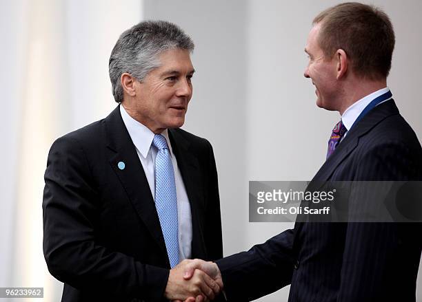 The Australian Minister for Foreign Affairs Stephen Smith is greeted by Deputy Leader of the House of Commons Chris Bryant MP as he arrives to attend...