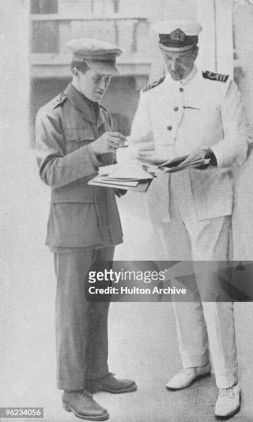 British intelligence officer, adventurer and author T. E. Lawrence with David George Hogarth at the Arab Bureau of Britain's Foreign Office, Cairo,...